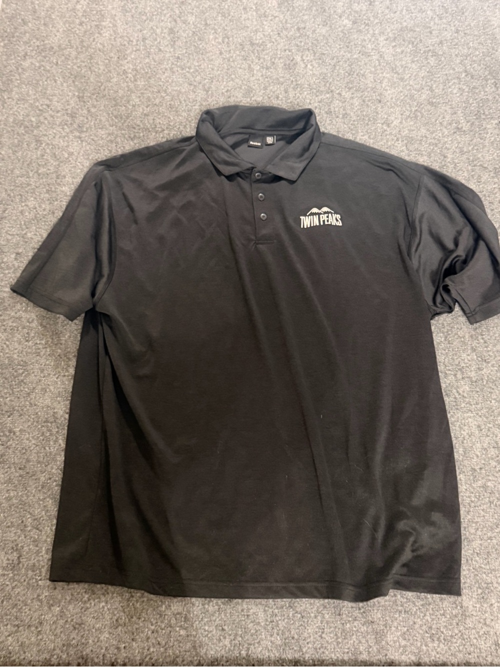 Reebok Black Polo with Twin Peaks Embroidered Logo